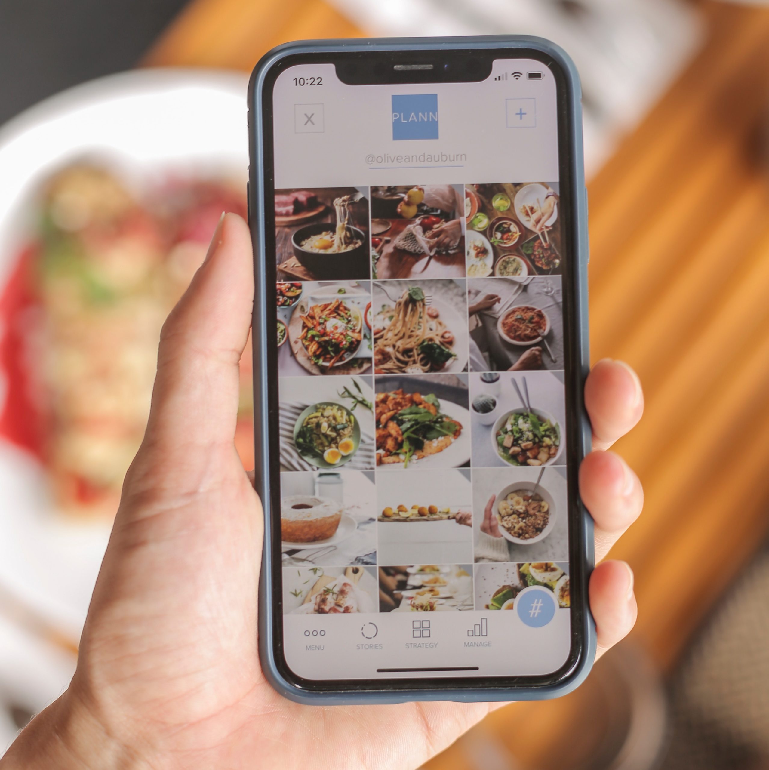 iPhone displaying Instagram feed of food images; blog: How to Increase Engagement with Instagram Carousel Posts