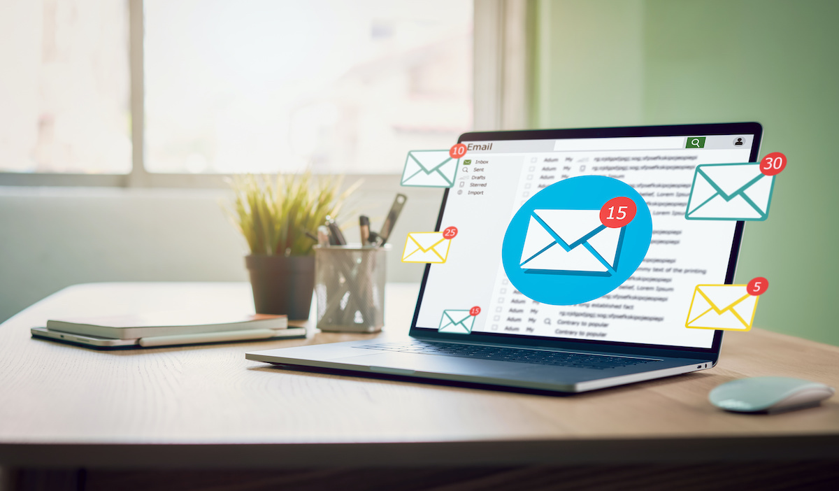 New email alert on laptop, communication connection message to global letters in the workplace; blog: email marketing mishaps