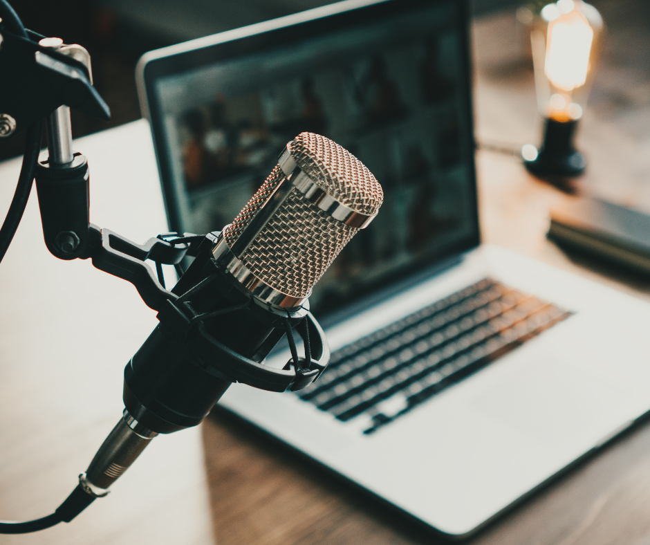 a microphone and computer used to start a podcast